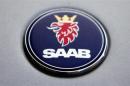 The logo of Swedish manufacturer Saab is seen on a car in Prague