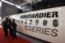 Visitors chat in front of Bombardier mock cabin at China International Aviation & Aeropsace Exhibition in China's Zhuhai