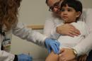 Flu Closes Schools, Flusters Hospitals Nationwide