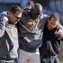 San Francisco Giants first base coach Roberto Kelly is helped off the field after getting hit with a ball during a practice session for baseball's National League championship series Saturday, Oct. 13, 2012, in San Francisco. The Cardinals play the San Francisco Giants in Game 1 of the NLCS on Sunday. (AP Photo/Mark Humphrey)