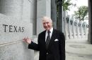 FILE - In this July 29, 2005, file photo, former House Speaker Jim Wright of Texas stands next to the Texas pillar while touring the World War II Memorial in Washington. Wright, a veteran Texas congressman who was the first House speaker in history to driven out of office in midterm, has died. He was 92. (AP Photo/Yuri Gripas, File)