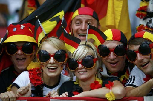 Germany soccer fans cheer before the Euro 2012 semi-final soccer match between Germany and Italy at National Stadium in Warsaw