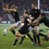 Dagg of New Zealand's All Blacks clears the ball as Bekker of South Africa's Springboks attempts to smother during their Rugby Championship test match in Dunedin