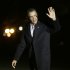 President Barack Obama waves to members of the media as walks across the South Lawn of the White House following his arrival on Marine One helicopter, Monday, Feb. 18, 2013. President Obama was returning from a weekend of golfing in Palm City, Fla. (AP Photo/Pablo Martinez Monsivais)