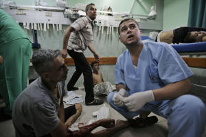 Palestinians, wounded in an Israeli strike at a house&nbsp;&hellip;