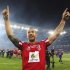 Australia's Queensland Reds Quade Cooper celebrates after winning the Super rugby final against New Zealand's Canterbury Crusaders in Brisbane