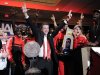 Louisville coach Rick Pitino and ten celebrate at the trophy ceremony after winning the NCAA Final Four tournament college basketball championship game against Michigan, Monday, April 8, 2013, in Atlanta.  Louisville won 82-76. (AP Photo/John Amis)