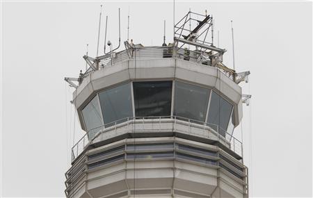 The main air traffic control tower at Reagan Washington National Airport is seen on March 24, 2011. REUTERS/Hyungwon Kang