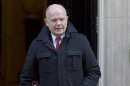 Britain's Foreign Secretary William Hague leaves Downing Street in central London