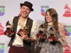 Jesse & Joy pose backstage with their four awards during the 13th Latin Grammy Awards in Las Vegas