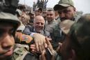 Iraq's Prime Minister al-Abadi tours the city of Tikrit after Iraq security forces regained control from Islamist State militants