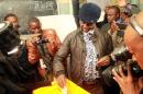 Patriotic Front presidential candidate Edgar Lungu votes on January 20, 2015 in Lusaka, Zambia