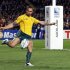 Australia Wallabies' Quade Cooper kicks from behind the try line during their Rugby World Cup semi-final match against New Zealand All Blacks at Eden Park in Auckland