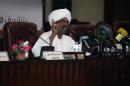 Sudanese President Omar al-Bashir speaks during a convention at the National Congress Party headquarters in Khartoum on September 27, 2014