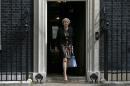 Britain's Home Secretary, Theresa May, leaves after attending a cabinet meeting at Number 10 Downing Street in London