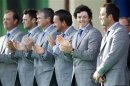 Team Europe golfer McIlroy stands with Hanson, Kaymer, Lawrie, McDowell and Molinari during the opening ceremony for the 39th Ryder Cup golf matches at the Medinah Country Club