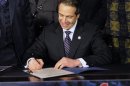 New York Governor Andrew Cuomo signs the New York Secure Ammunition and Firearms Enforcement Act in Albany
