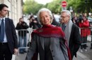 International Monetary Fund chief Christine Lagarde arrives for a second day of the court hearing at a special court house, in Paris, Friday, May 24, 2013. Lagarde faced questioning at a special Paris court Friday over her role in the 400 million euro ($520 million) pay-off to a controversial businessman when she was France's finance minister. (AP Photo/Thibault Camus)