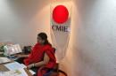 An employee works inside the office of the Centre for Monitoring Indian Economy in Mumbai