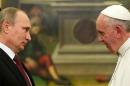Pope Francis meets with Russian President Vladimir Putin during a private audience at the Vatican, on November 25, 2013