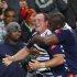 Liebenberg of the South Africa's Stormers celebrates with teammate Siya Kolisi (R) after scoring a try during their Super Rugby union clash with Australia's Waratahs in Cape Town