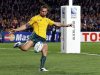 Australia Wallabies' Quade Cooper kicks from behind the try line during their Rugby World Cup semi-final match against New Zealand All Blacks at Eden Park in Auckland