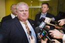 Mayor Ford arrives at his office in Toronto