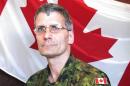 Warrant Officer Patrice Vincent, a member of the Joint Personnel Support Unit, Integrated Personnel Support Centre St-Jean, is pictured in this undated handout photo