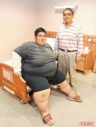 吳健順（左）體重直線飆到226公斤，最後以胃繞道手術減重。圖右為吳父。 <BR>丁治綱攝