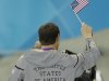 United States' Michael Phelps waves the American Flag after getting his 18th gold medal at the Aquatics Centre in the Olympic Park during the 2012 Summer Olympics in London, Saturday, Aug. 4, 2012. (AP Photo/Matt Slocum)