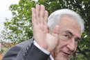 FILE - In this May 6, 2012 file photo, former International Monetary Fund leader, Dominique Strauss-Kahn, waves as he leaves a polling station after voting for the second round of the French presidential elections in Sarcelles, north of Paris. A French prosecutor on Monday, May 21, 2012 opened a preliminary investigation into allegations of rape in a Washington hotel by former IMF chief and one-time French presidential hopeful Dominique Strauss-Kahn. (AP Photo/Zacharie Scheurer, File)