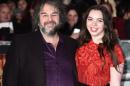 New Zealand director Peter Jackson poses with daughter Katie at the world premier of "The Hobbit: The Battle of the Five Armies" in London on December 1, 2014