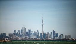 Toronto skyline is seen from a lakefront&nbsp;&hellip;