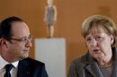 L'exercice d'unité franco-allemand brouillé par Hollande