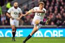England's fly-half Owen Farrell kicks a penalty during the international rugby union test match against New Zealand at Twickenham Stadium, southwest of London on November 16, 2013