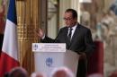 French President Francois Hollande attends his news conference at the Elysee Palace in Paris