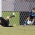 Tottenham Hotspur's goalkeeper Carlo Cudicini makes a save on Los Angeles Galaxy's Robbie Keane during the first half of an international friendly soccer match in Carson, California