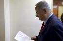 Israeli Prime Minister Netanyahu arrives to the weekly cabinet meeting in Jerusalem