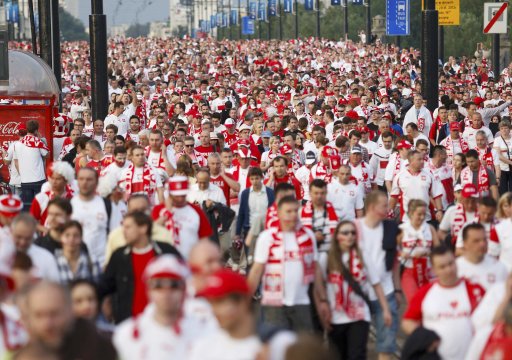 Polish fans leave the National Stadium after the Group A Euro 2012 soccer match between Poland and Greece in Warsaw