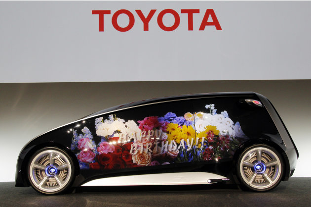 A Toyota Fun-Vii with its whole body can be used as a display space is shown in Tokyo Monday, Nov. 28, 2011. Toyota Motor Corp. unveiled the futuristic concept car resembling a giant smartphone to dem