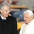 Pope Benedict XVI is welcomed by the Italian Premier Mario Monti, left, as he arrives to board a plane to Benin, at Fiumicino international airport, near Rome, Friday, Nov. 18, 2011. Pope Benedict XVI had his first meeting with Italy's new leader on the tarmac of Rome's airport just before taking off for a trip to Africa. Premier Mario Monti greeted the pope as Benedict descended from the helicopter that brought him from the Vatican to Rome's airport. They chatted as they walked slowly across the tarmac to the pope's waiting plane. Benedict then took off for the west African nation of Benin for a three-day visit where he will speak of the role of the church in Africa. (AP Photo/Riccardo De Luca)