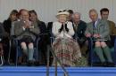 Britain's Queen Elizabeth II, her husband Prince Philip (L) and eldest son Prince Charles (R) attend the Braemar Gathering in central Scotland, on September 6, 2014