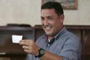 Pablo Perez casts his vote at a polling station in Maracaibo