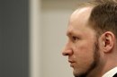 Norwegian mass killer Breivik reacts as he returns after a break to the court room, in Oslo Courthouse