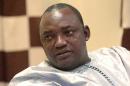 Gambian president-elect Adama Barrow, seen December 12, 2016, said in a Christmas message, "If the colonialists could peacefully hand over executive power... (we) should be able to show a better example to our children"