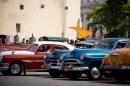 Cuban taxi drivers wait for passengers in their old cars in Havana, on September 11, 2009