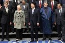 German Foreign Minister Westerwelle, U.S. Secretary of State Clinton, Japanese Foreign Minister Gemba, Afghan President Karzai and Japan's Prime Minister Noda pose at the Tokyo Conference in Tokyo