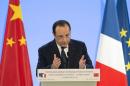 French President Hollande delivers a speech to mark fifty years of diplomatic relations between France and China at the French Foreign Ministry in Paris