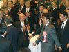 In this photo taken Monday, Jan. 7, 2013. Japanese Prime Minister Shinzo Abe, second from right, arrives for Japan's business organizations' joint New Year's party in Tokyo. Japan's ruling Liberal Democratic Party was in the final stages of drafting fresh stimulus spending Thursday, Jan. 10, reportedly totaling more than 20 trillion yen ($227 billion), rushing to fulfill campaign pledges to break the world's third-biggest economy out of its deflationary slump. Economy minister Akira Amari and Abe discussed details of the proposed stimulus package ahead of an announcement expected on Friday, officials said. (AP Photo/Shizuo Kambayashi)