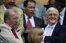 British journalist David Frost; Viscount Linley and interviewer Michael Parkinson sit on Centre Court for the semi-final match between Tommy Haas of Germany and Roger Federer of Switzerlandat the Wimbledon tennis championships in London